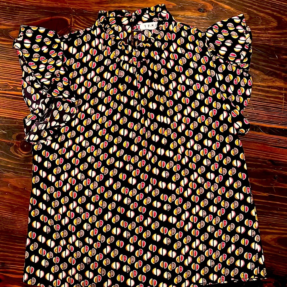 THML sleeveless multi-colored sleeveless blouse with button closure
